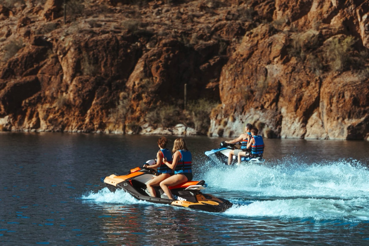 Two Wave and Ridge rental jet skis running an Arizona canyon lake